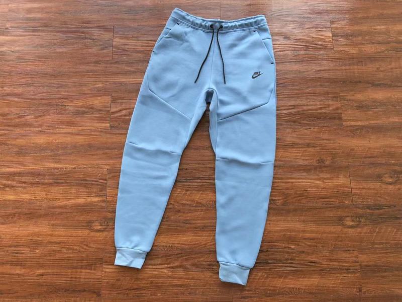 NIKE Tech Fleece Pants - Light - Blue Unisex Streetwear Limited Edition - The NIKE TECH FLEECE PANTS LIGHT BLUE - REPLICA blend modern athletic performance with sleek