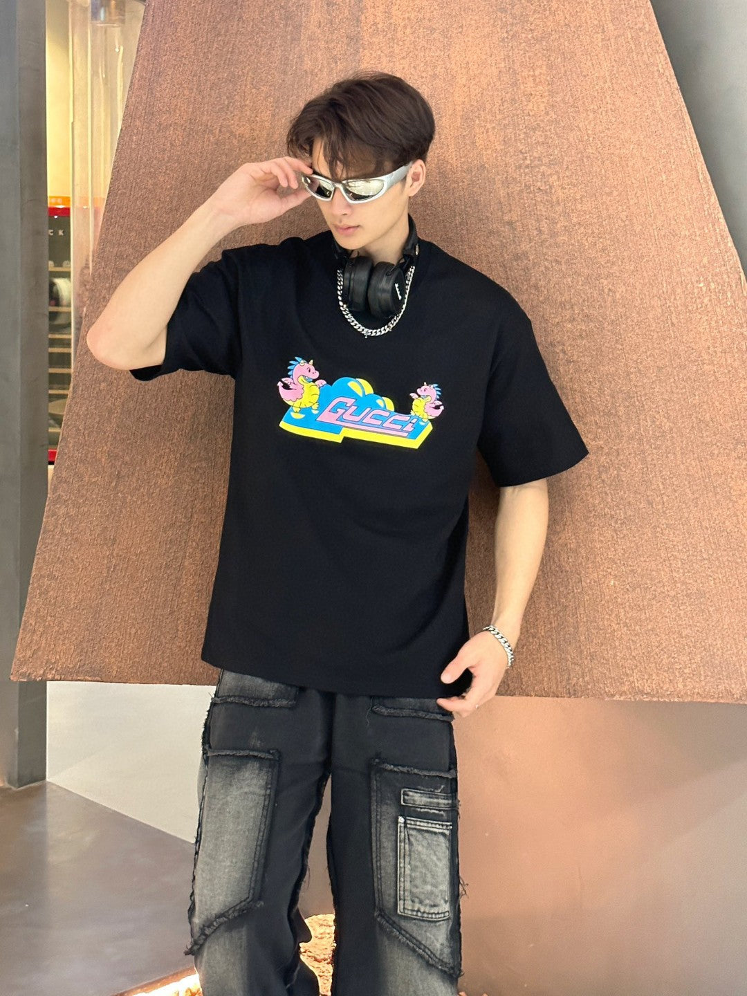 Gucci T-shirt With Pink Dinosaur Graphic - Black Unisex Streetwear Limited Edition - <span>Fun and trendy. Features colorful pink dinosaur cartoons. Gucci logo in the center. Made from