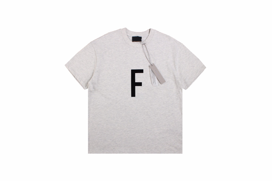 Fear Of God Letter F T-shirt (light Grey) Unisex Streetwear Limited Edition - <p dir='ltr'><span>This Fear of God t-shirt features a bold letter 'F' graphic on the