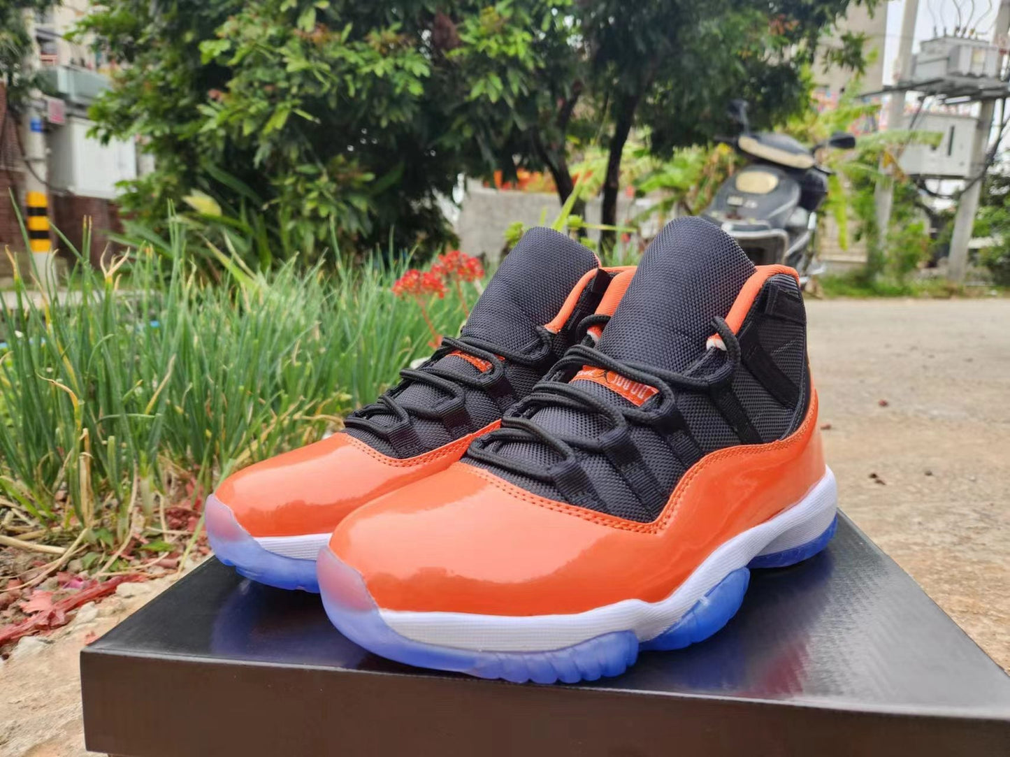 JORDAN 11 Orange And - Black Unisex Streetwear Limited Edition - The Air Jordan 11 in this vibrant orange and black colorway is a bold addition