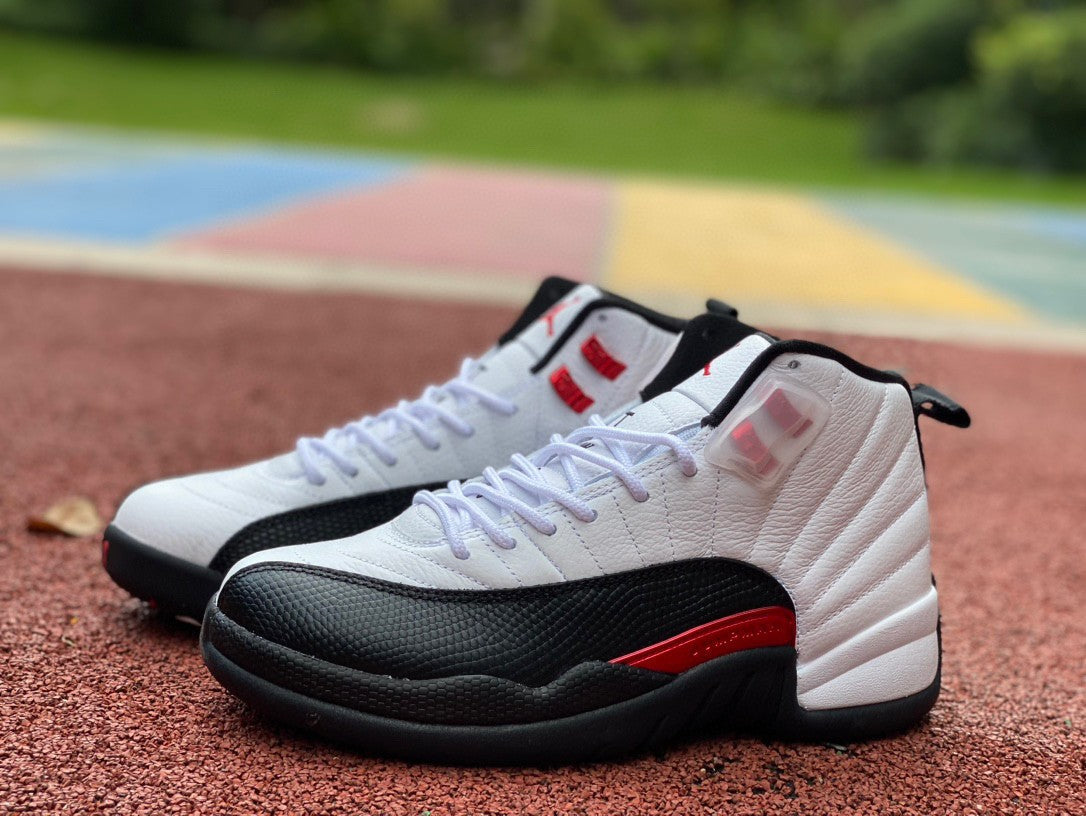 Jordan 12 Retro 'white - - Red' Sneakers - Black Unisex Streetwear Limited Edition - **Product Description: Air Jordan 12 Retro 'White/Black/Red'** The Air Jordan 12 Retro 'White/Black/Red' is a