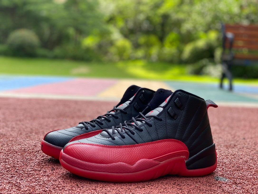 Jordan 12 Flu Game - Black Unisex Streetwear Limited Edition - Introducing the Air Jordan 12 Retro in a striking black and red colorway, a timeless