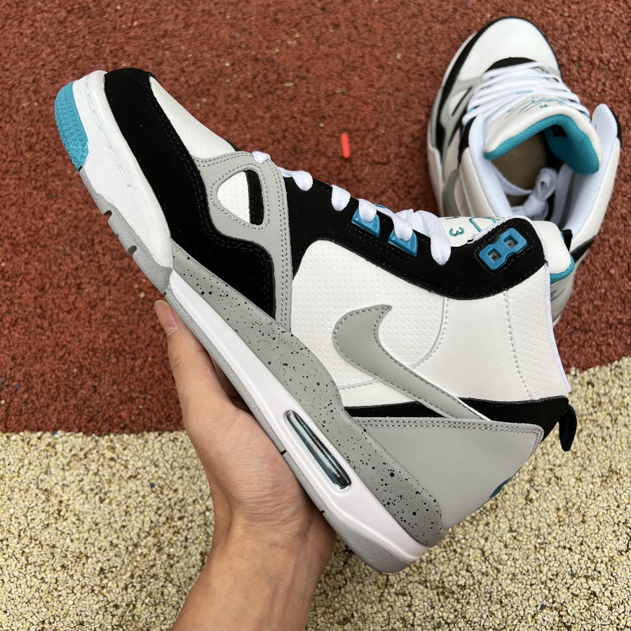 Jordan 13 Flight Mid Sneakers - Black Unisex Streetwear Limited Edition - The sneaker featured in the image is the Nike Air Flight 89 'White/Cool Grey/Aquamarine,' a
