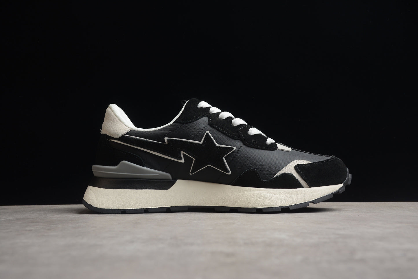 BAPE Sta Retro Runner And White Sneakers - Black Unisex Streetwear Limited Edition - **BAPE STA Retro Runner Black and White Sneakers** Step into timeless style with the BAPE
