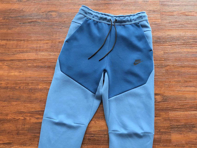 NIKE Tech Fleece Pants - Dutch - Court - Blue Unisex Streetwear Limited Edition - The NIKE TECH FLEECE PANTS DUTCH BLUE/COURT BLUE - REPLICA offer the perfect fusion of