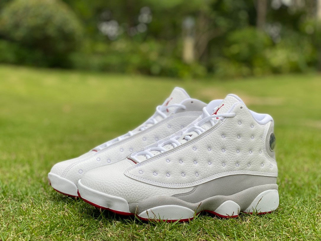 Jordan 13 Retro 'history Of Flight' - White Unisex Streetwear Limited Edition - The Air Jordan 13 Retro 'History of Flight' is a striking blend of classic design