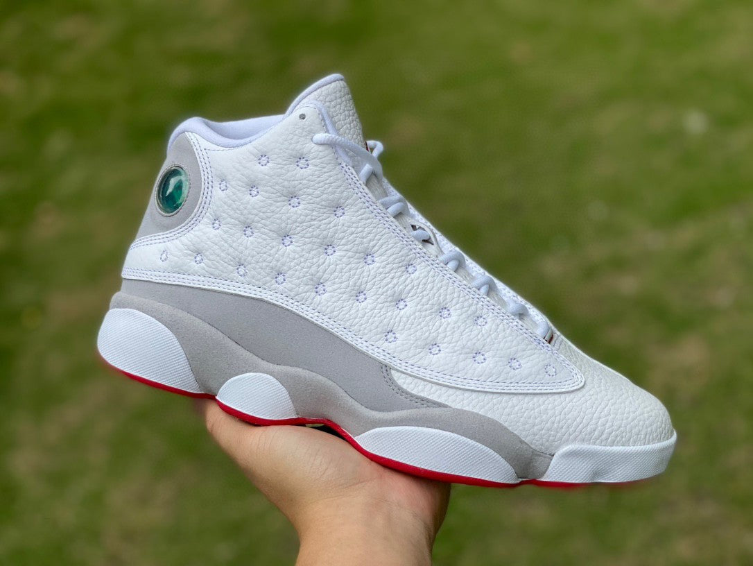 Jordan 13 Retro 'history Of Flight' - White Unisex Streetwear Limited Edition - The Air Jordan 13 Retro 'History of Flight' is a striking blend of classic design