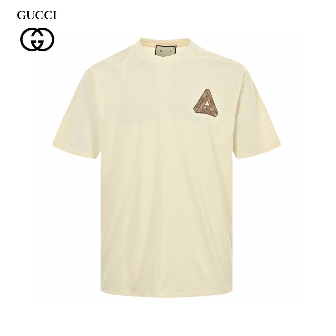 Gucci Triangle Logo T-shirt - Beige Unisex Streetwear Limited Edition - This Gucci t-shirt features a subtle triangle logo on the chest. The shirt is primarily