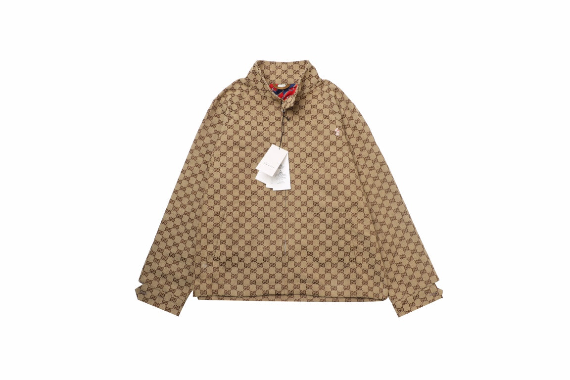 Gucci Monogram Track Jacket - Red Unisex Streetwear Limited Edition - This Gucci track jacket showcases the iconic Gucci monogram pattern in a classic brown color.