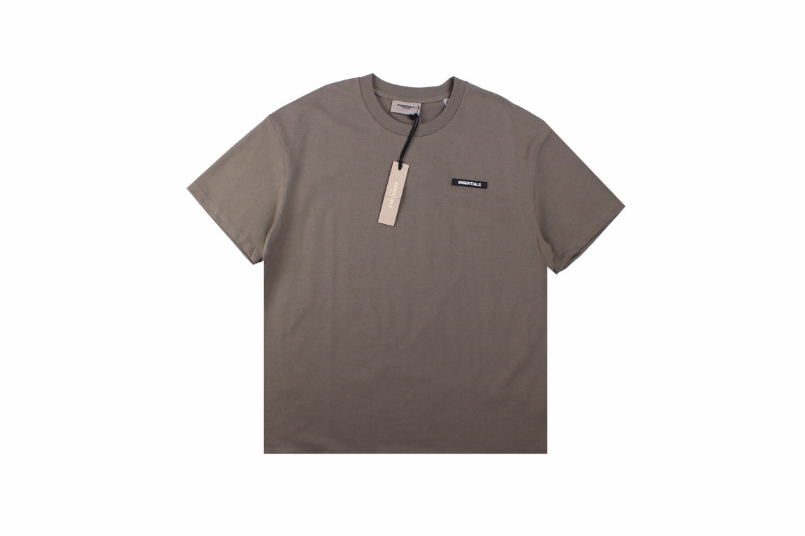 Fear Of God Essentials Logo T-shirt - Taupe - White Unisex Streetwear Limited Edition - This taupe-colored t-shirt from Fear of God Essentials features the same discreetly styled logo as