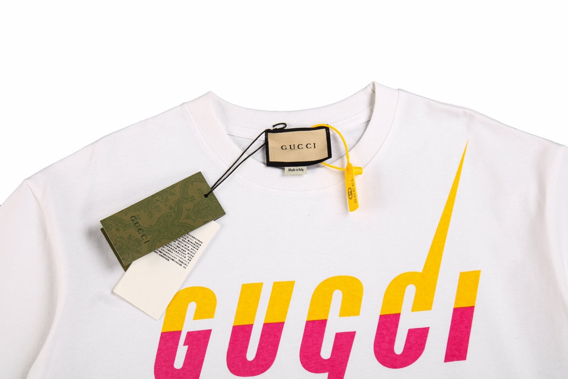 Gucci T-shirt With Retro Logo - White Unisex Streetwear Limited Edition - <p dir='ltr'><span>White t-shirt featuring a bold Gucci logo in a retro font with pink
