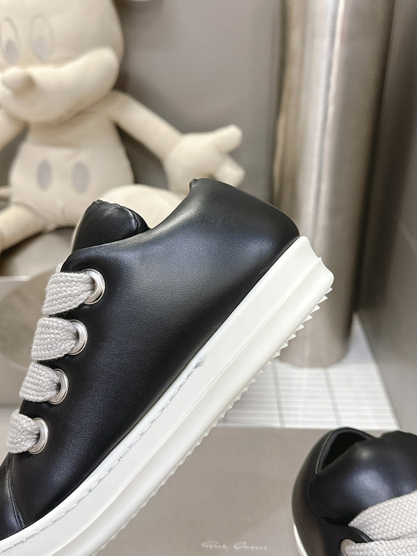 Rick Owens Low-top Sneakers - Black Unisex Streetwear Limited Edition - **Rick Owens Black Low-Top Sneakers: Avant-Garde Elegance and Comfort** Step into the future of fashion
