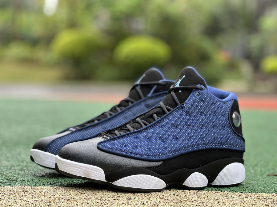 Jordan 13 Retro 'brave Blue' Sneakers Unisex Streetwear Limited Edition - The sneakers shown are the Air Jordan 13 Retro 'Navy,' also known as 'Brave Blue.'