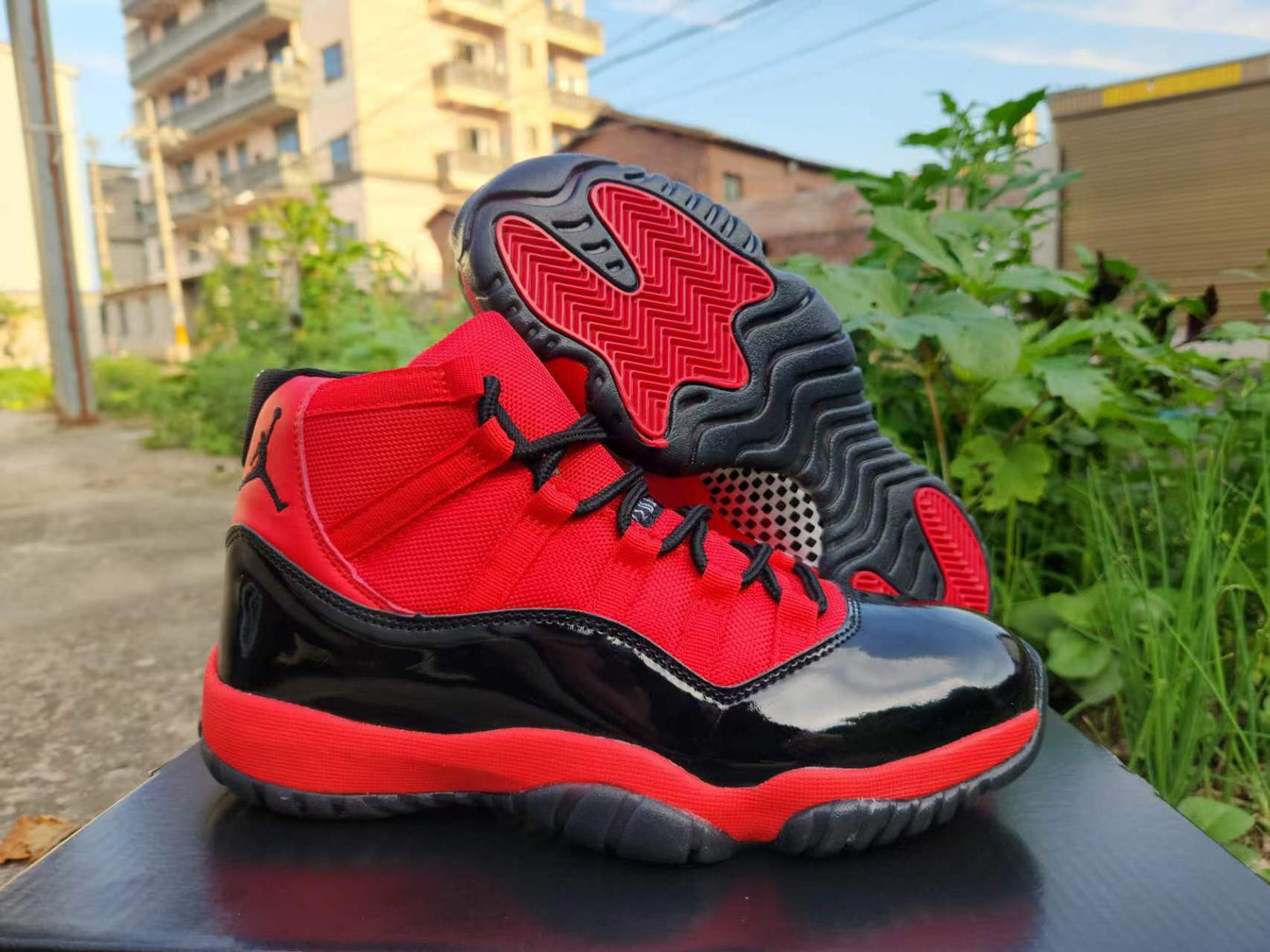 JORDAN 11 And Red - Black Unisex Streetwear Limited Edition - The Air Jordan 11 showcased here is a vibrant and energetic take on the classic