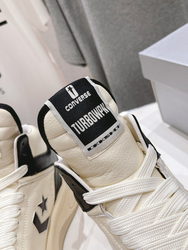 Rick Owens Cream And High-top Sneakers - Black Unisex Streetwear Limited Edition - **Rick Owens Cream and Black High-Top Sneakers: A Blend of Modern Aesthetics and Superior Craftsmanship**