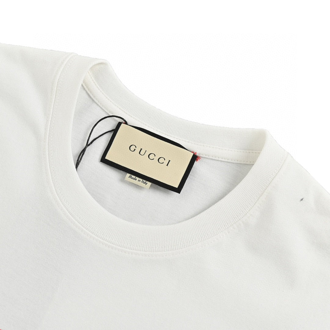 Gucci T-shirt With Overlapping Logo - White Unisex Streetwear Limited Edition - <span>Modern and trendy. Features overlapping Gucci logo in red and blue. Made from high-quality fabric.