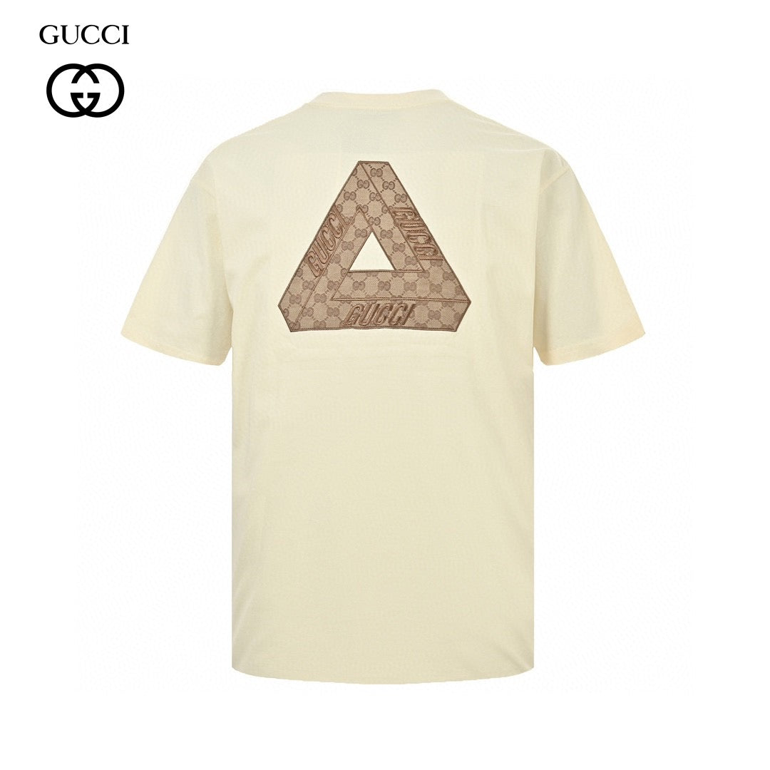 Gucci Triangle Logo T-shirt - Beige Unisex Streetwear Limited Edition - This Gucci t-shirt features a subtle triangle logo on the chest. The shirt is primarily