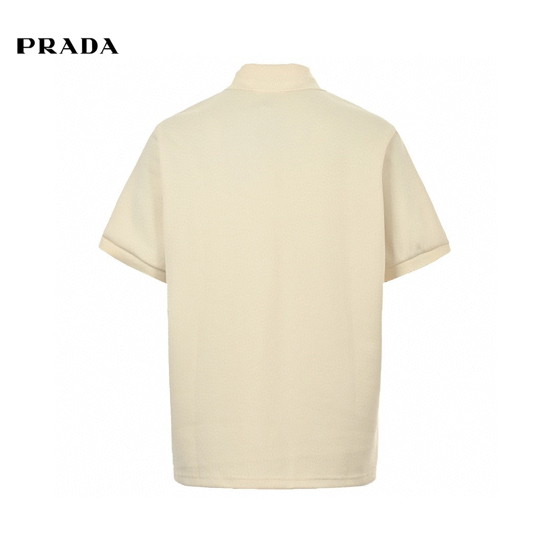 Prada Polo Shirt - Cream Unisex Streetwear Limited Edition - This Prada polo shirt features a simple yet elegant cream design. The shirt is adorned