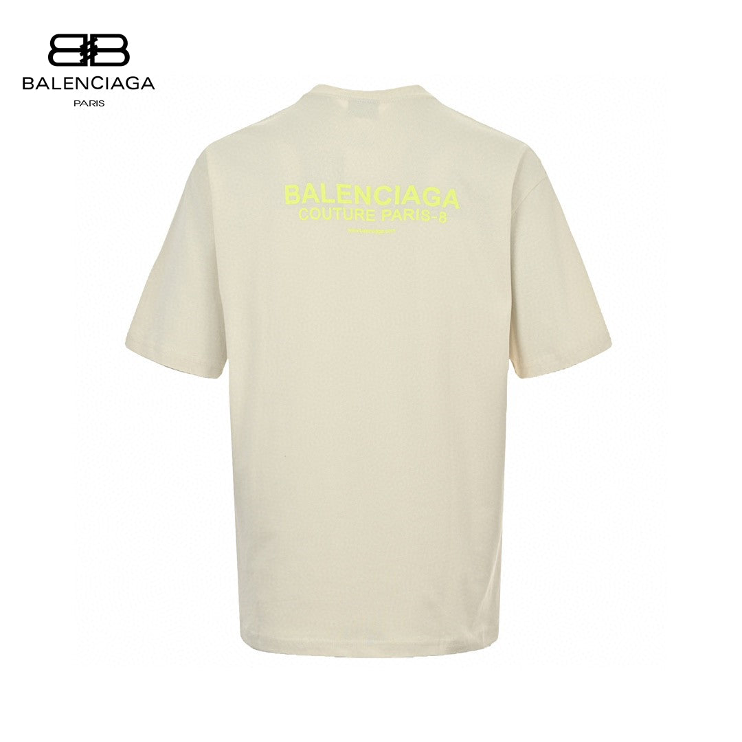 Balenciaga T-shirt - Yellow Unisex Streetwear Limited Edition - This Balenciaga t-shirt features a minimalist cream design. The front is adorned with the Balenciaga