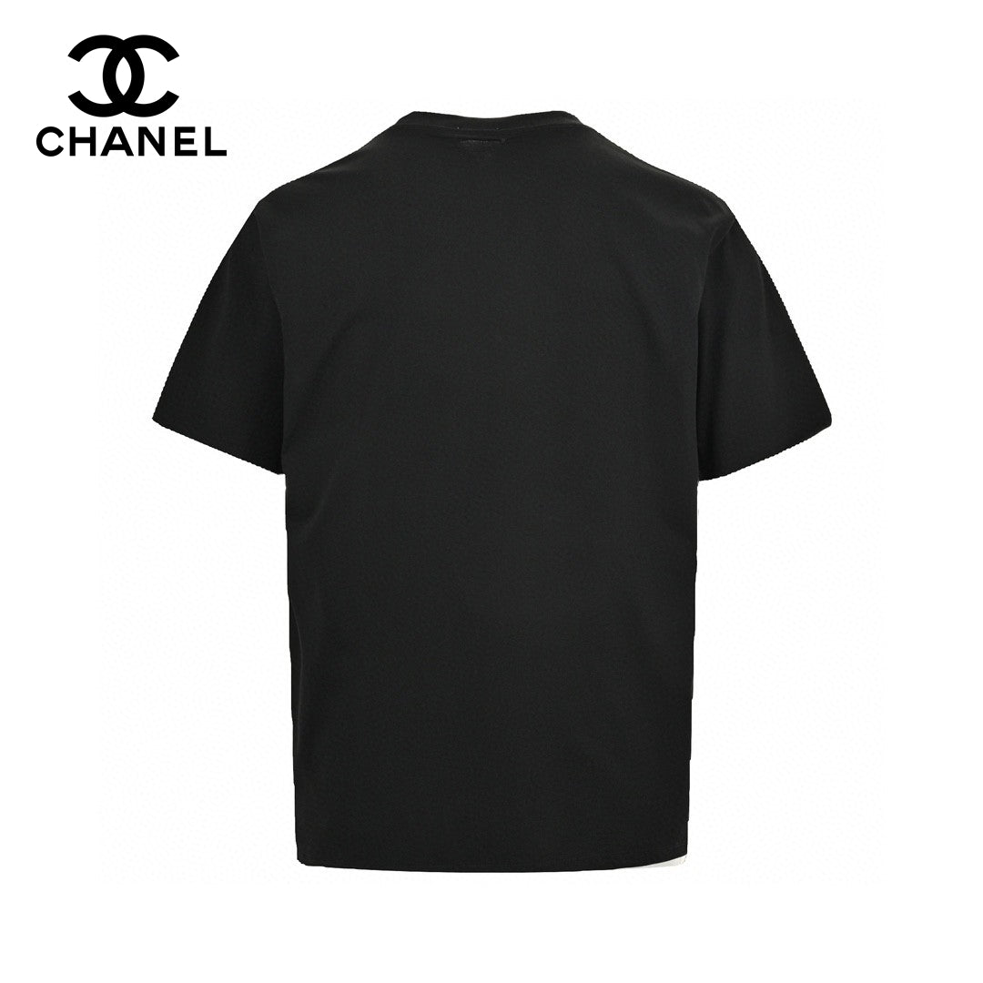 Chanel T-shirt - Black Unisex Streetwear Limited Edition - This Chanel t-shirt features a large, iconic double C logo graphic on the front. The