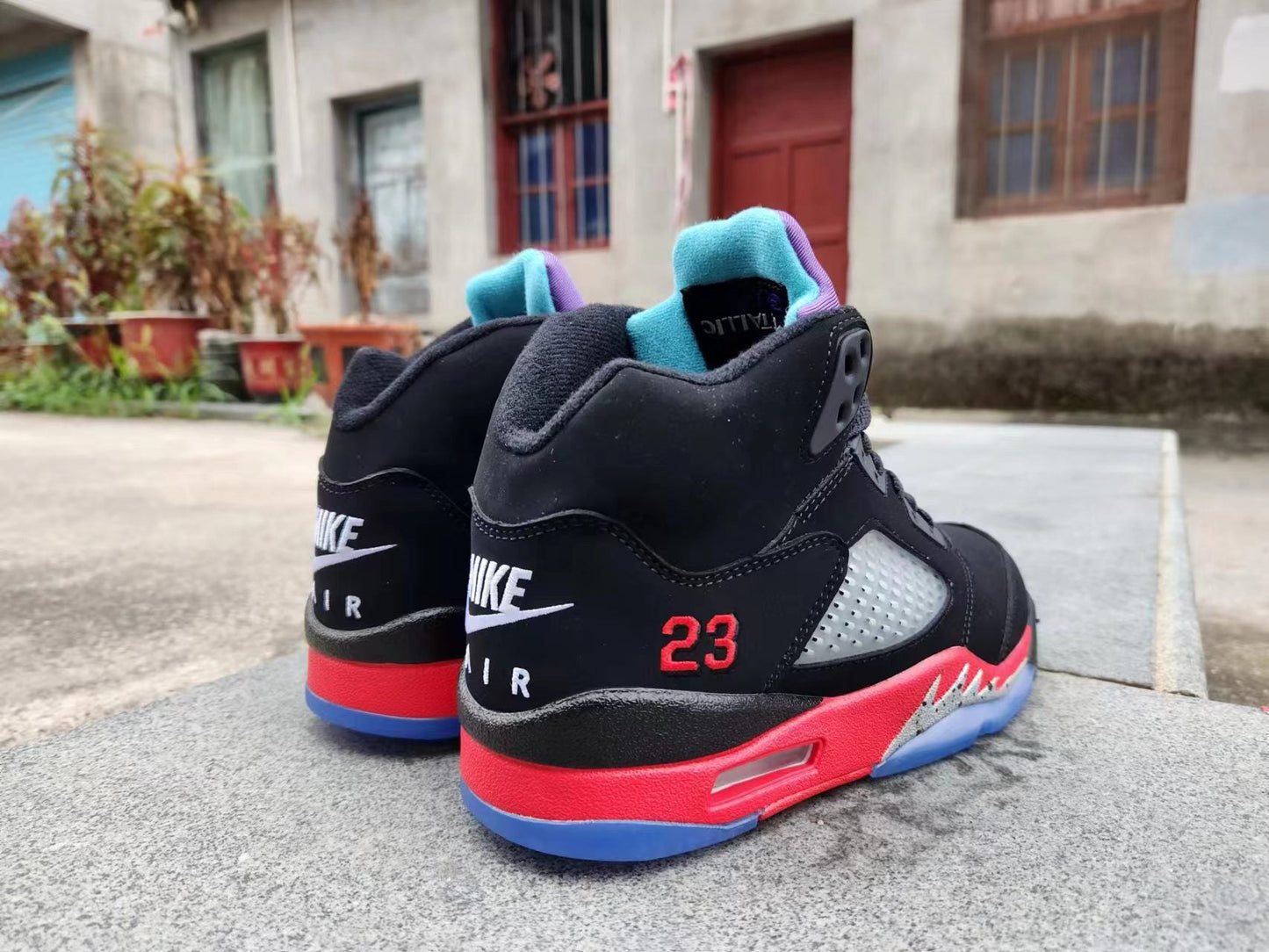 Jordan 5 Black, Red And Purple Unisex Streetwear Limited Edition - Step up your sneaker game with the Air Jordan 5 in a striking black, red,