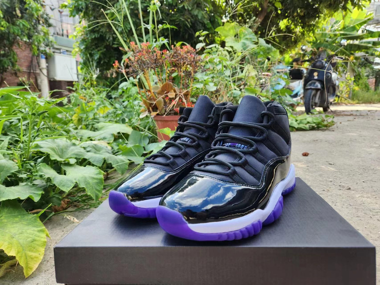 JORDAN 11 And Purple - Black Unisex Streetwear Limited Edition - The Air Jordan 11 in Black and Concord Purple is a bold and dynamic rendition