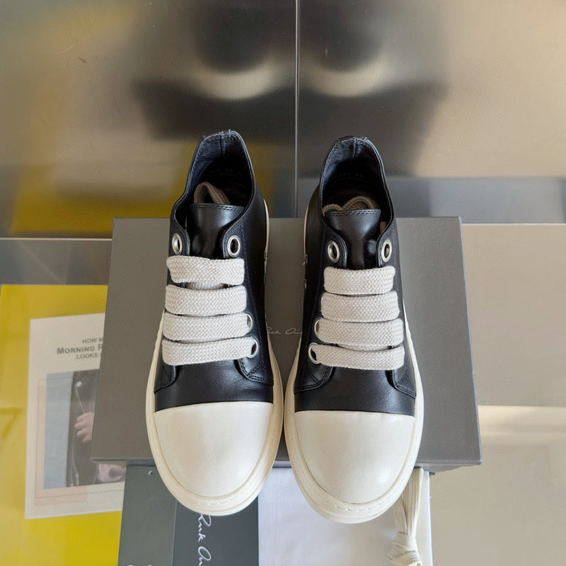 Rick Owens Low-top Sneakers - Black Unisex Streetwear Limited Edition - **Rick Owens Black Low-Top Sneakers: Modern Elegance and Superior Craftsmanship** Introducing the Rick Owens Black