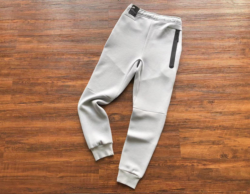 NIKE Tech Fleece Pants - Wolf Grey - Aquamarine - - Orange Unisex Streetwear Limited Edition - The NIKE TECH FLEECE PANTS WOLF GREY/AQUAMARINE/ORANGE - REPLICA offer a modern fusion of performance,