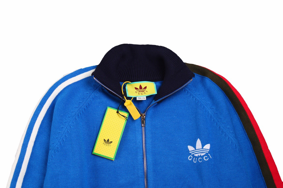 Gucci - Adidas Track Jacket - Blue Unisex Streetwear Limited Edition - This Gucci x Adidas track jacket comes in a vibrant blue color. It features a