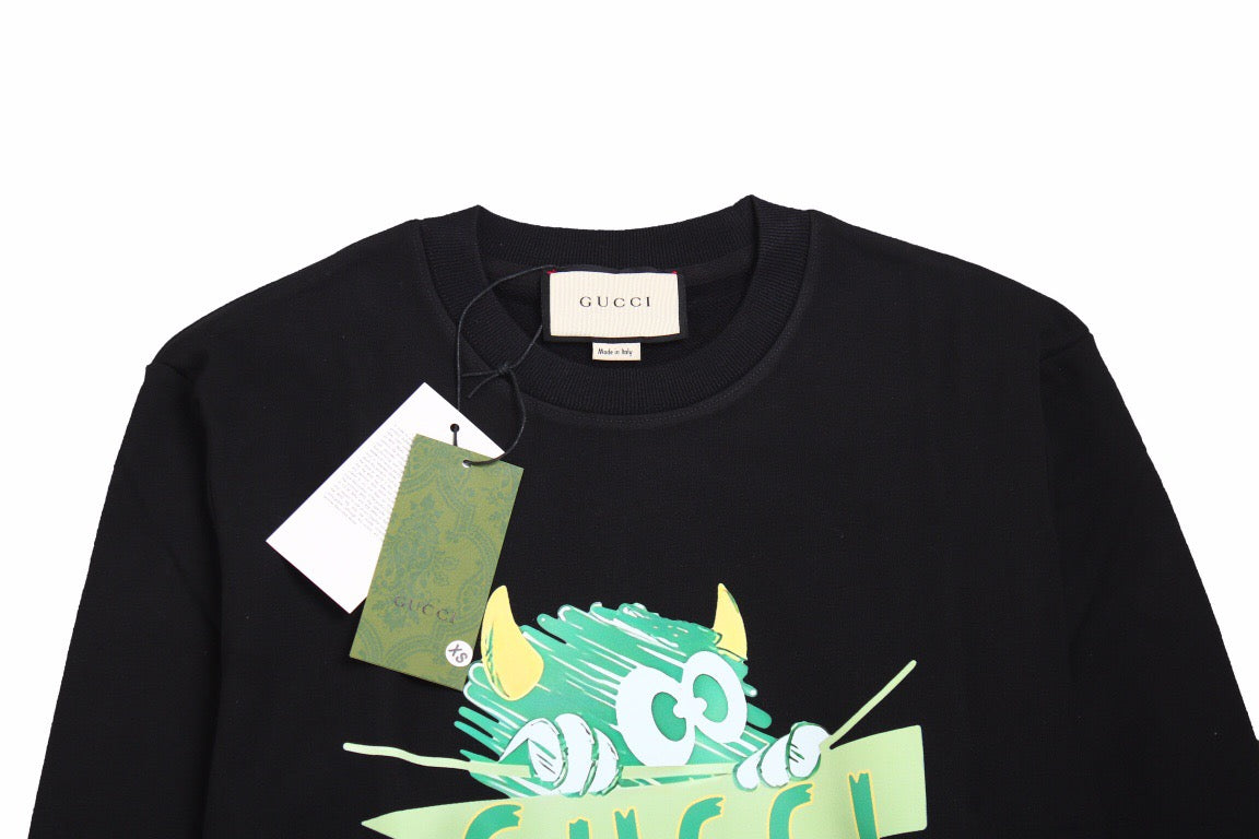 Gucci Monster Graphic Sweatshirt - Black Unisex Streetwear Limited Edition - This Gucci sweatshirt in black features a playful monster graphic with vibrant colors and the