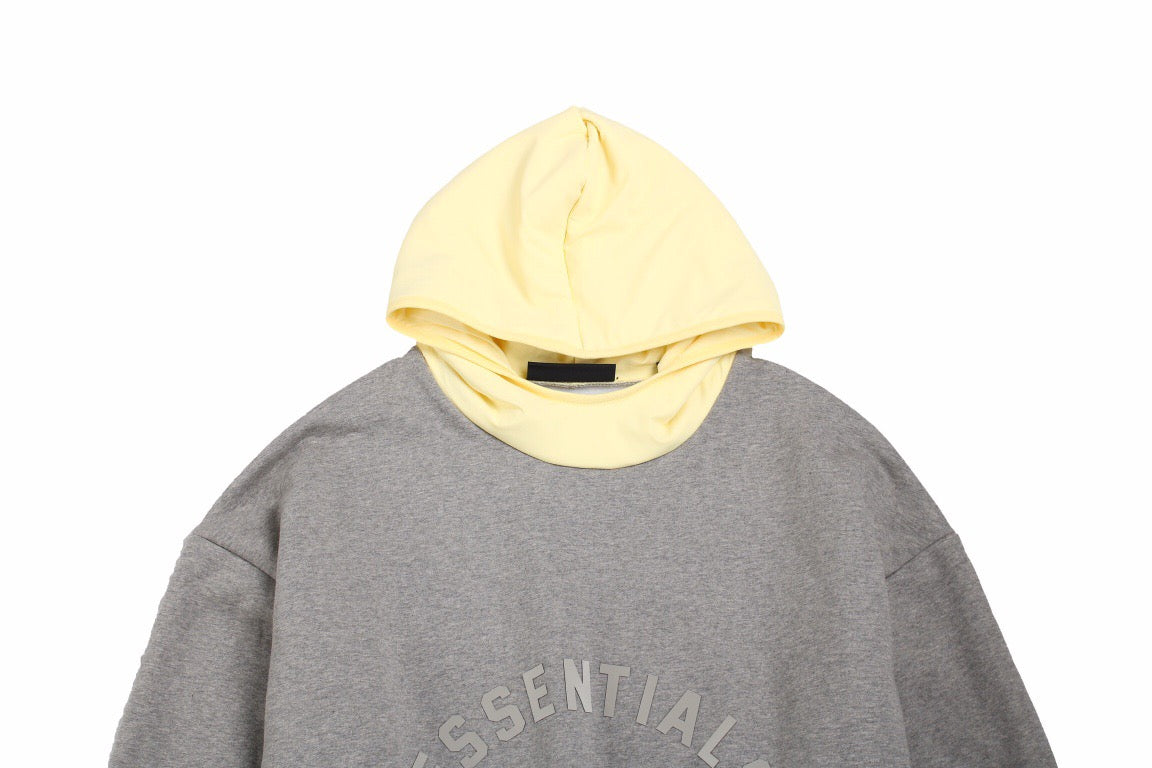 Fear Of God Essentials Hoodie - Grey With Hood - Yellow Unisex Streetwear Limited Edition - This grey Fear of God Essentials hoodie features a subtle 'ESSENTIALS FEAR OF GOD' logo