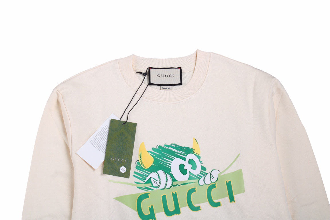 Gucci Monster Graphic Sweatshirt - Cream Unisex Streetwear Limited Edition - This Gucci sweatshirt in cream features a playful monster graphic with vibrant colors and the