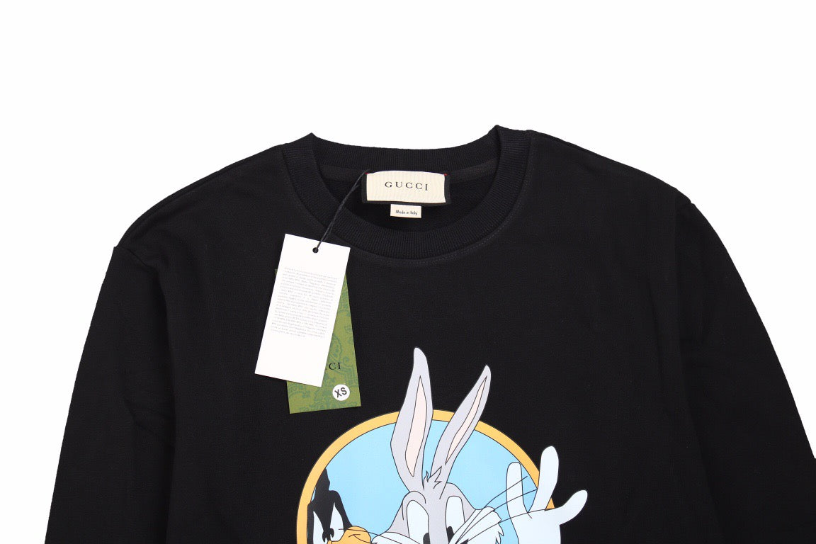 Gucci Bugs Bunny Sweatshirt - - Black Unisex Streetwear Limited Edition - This black Gucci sweatshirt features a vibrant graphic of Bugs Bunny holding a carrot, paired