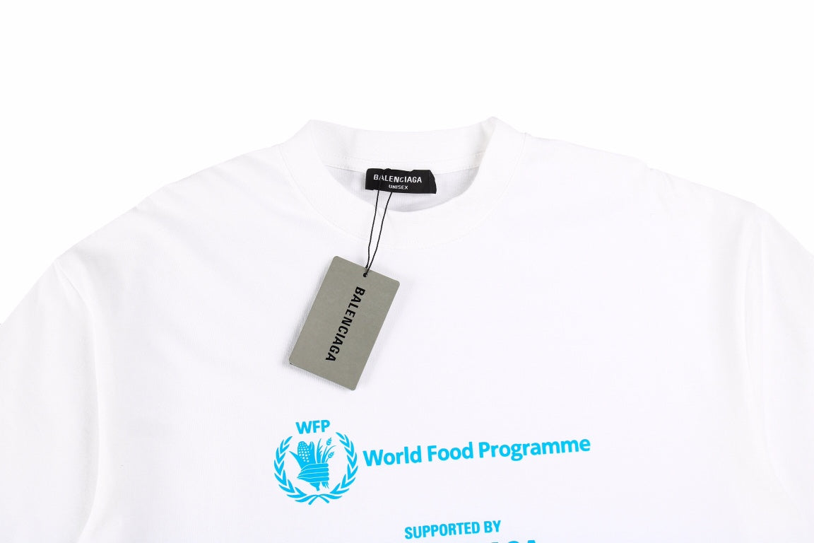 Balenciaga World Food Programme T-shirt - White Unisex Streetwear Limited Edition - This white Balenciaga t-shirt features the World Food Programme (WFP) logo, symbolizing the brand's support