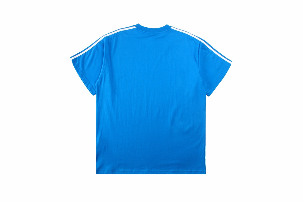 Balenciaga T-shirt With Adidas Collaboration - Blue Unisex Streetwear Limited Edition - <p dir='ltr'><span>Blue t-shirt featuring the iconic Adidas three stripes on the shoulders and a