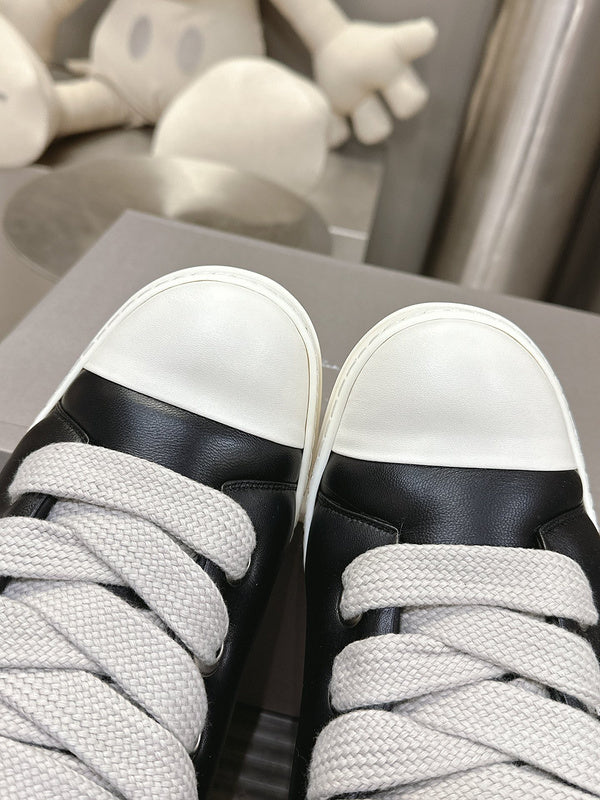 Rick Owens Low-top Sneakers - Black Unisex Streetwear Limited Edition - **Rick Owens Black Low-Top Sneakers: Avant-Garde Elegance and Comfort** Step into the future of fashion