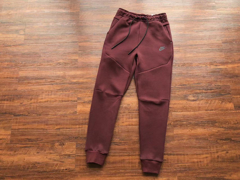 NIKE Tech Fleece Pants - Berry - Pomegranate - Red Unisex Streetwear Limited Edition - The NIKE TECH FLEECE PANTS BERRY/POMEGRANATE - REPLICA combine modern athletic performance with a bold,