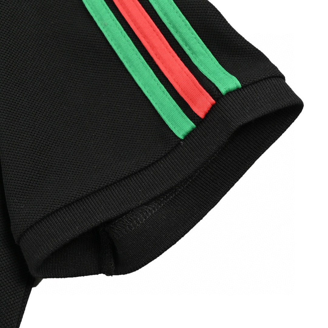 Gucci Stripe Sleeve Polo Shirt - Black Unisex Streetwear Limited Edition - <span>This Gucci polo shirt features a sleek black color with the iconic green and red