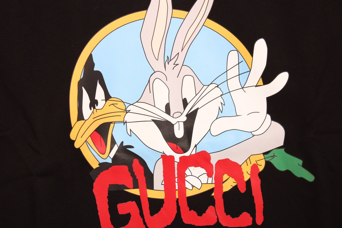 Gucci Bugs Bunny Sweatshirt - - Black Unisex Streetwear Limited Edition - This black Gucci sweatshirt features a vibrant graphic of Bugs Bunny holding a carrot, paired