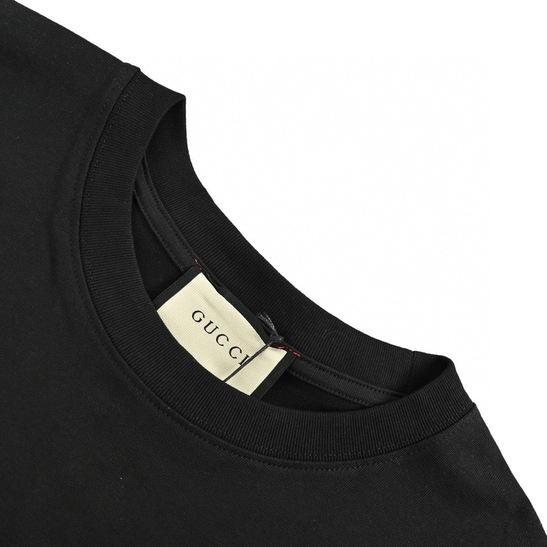 Gucci Vintage Logo T-shirt (black) Unisex Streetwear Limited Edition - The Gucci Vintage Logo T-Shirt in black showcases a striking retro-inspired logo in red and