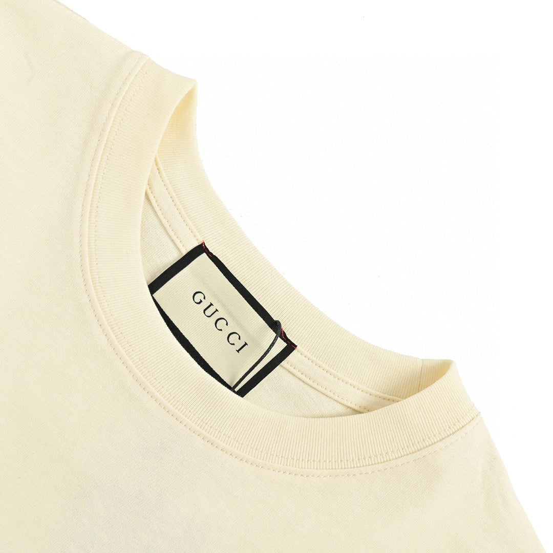 Gucci Vintage Logo T-shirt - White Unisex Streetwear Limited Edition - The Gucci Vintage Logo T-Shirt features a nostalgic design with a retro-inspired logo in red