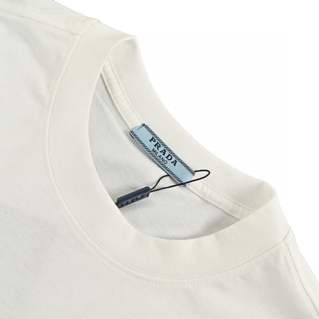 Prada T-shirt - White Unisex Streetwear Limited Edition - This Prada t-shirt features a minimalist white design. It has a small chest pocket with