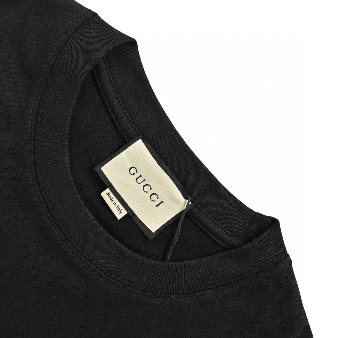 Gucci Triangle Logo T-shirt - Black Unisex Streetwear Limited Edition - This Gucci t-shirt features a subtle triangle logo on the chest. The shirt is primarily