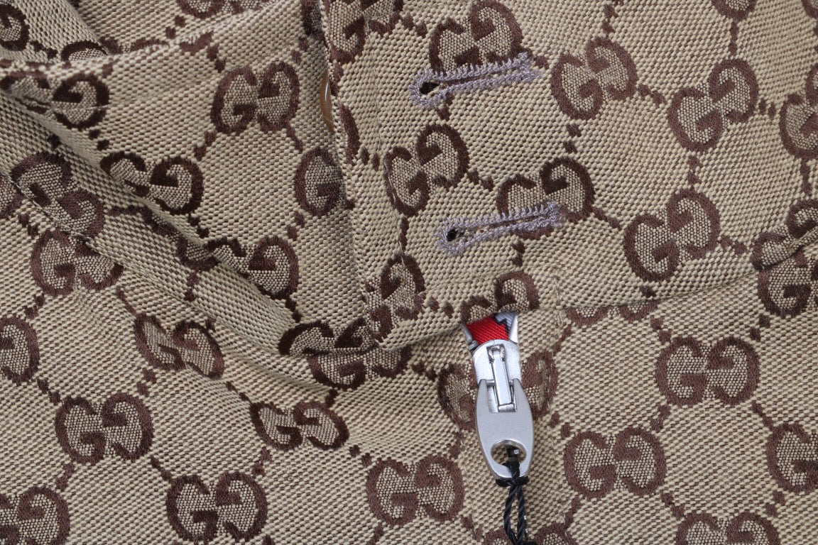 Gucci Monogram Track Jacket - Red Unisex Streetwear Limited Edition - This Gucci track jacket showcases the iconic Gucci monogram pattern in a classic brown color.