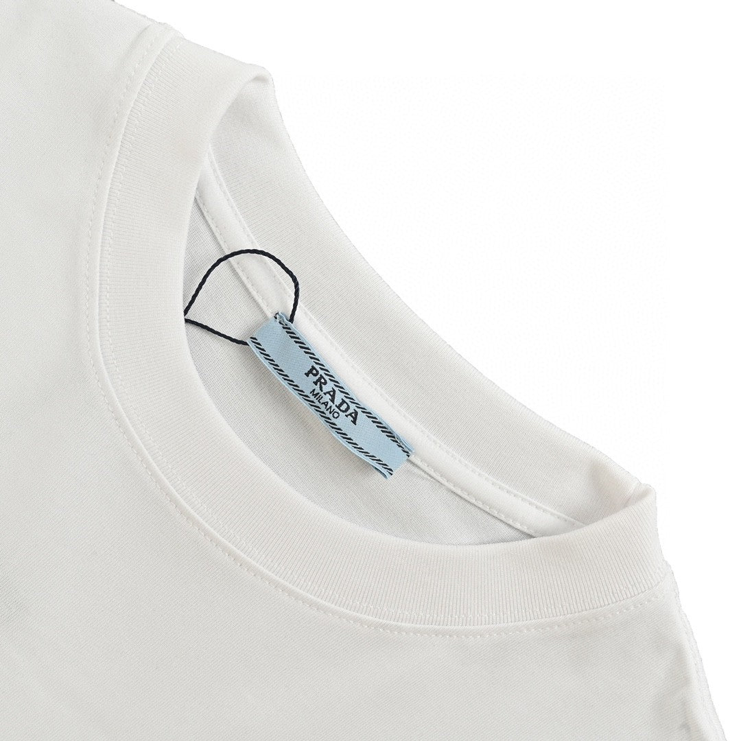 Prada Milano Logo T-shirt - White Unisex Streetwear Limited Edition - This Prada t-shirt features the iconic Prada Milano logo on the chest. The clean and