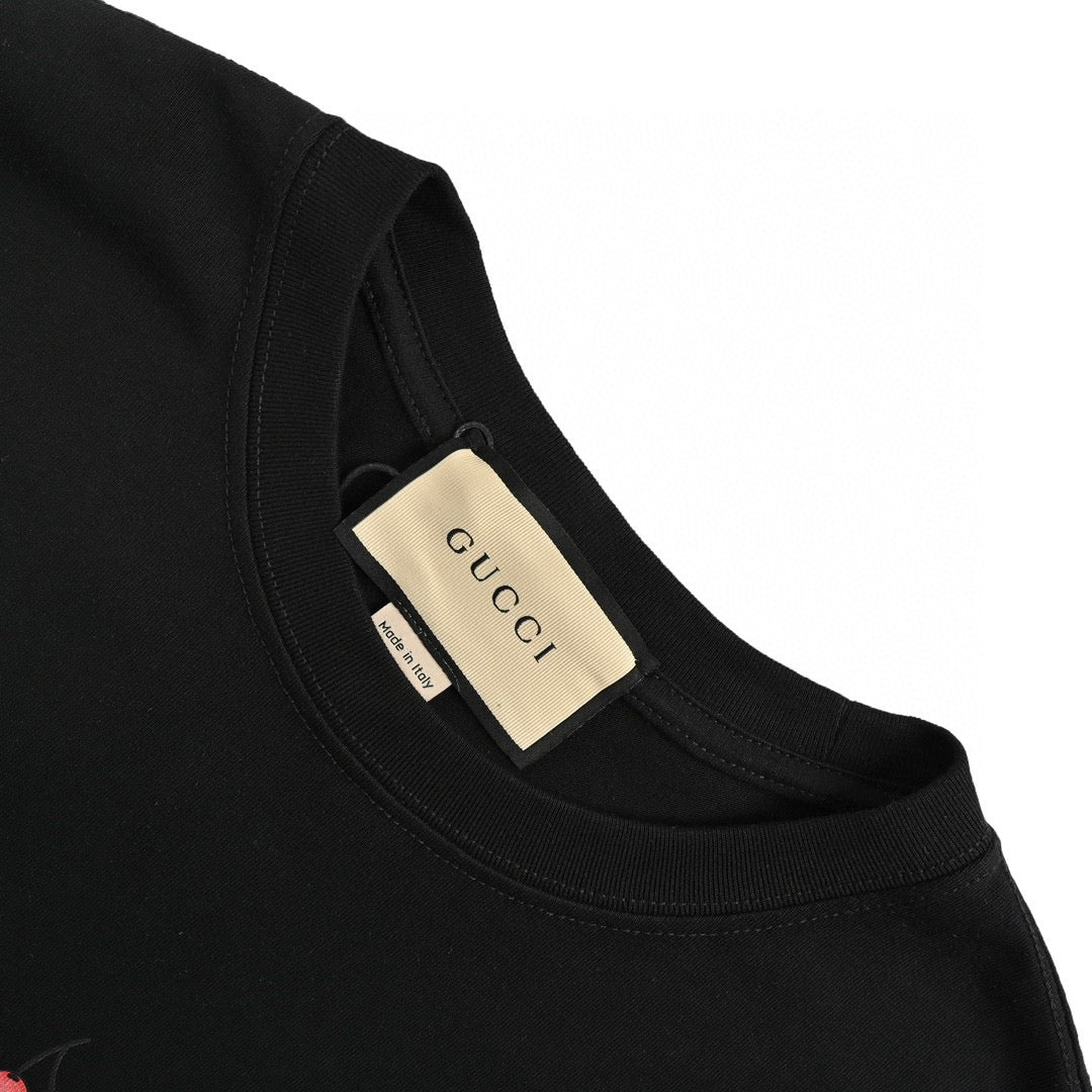 Gucci Cartoon Cow Logo T-shirt (black) Unisex Streetwear Limited Edition - The Gucci Cartoon Cow Logo T-Shirt in black brings a playful twist to luxury fashion.
