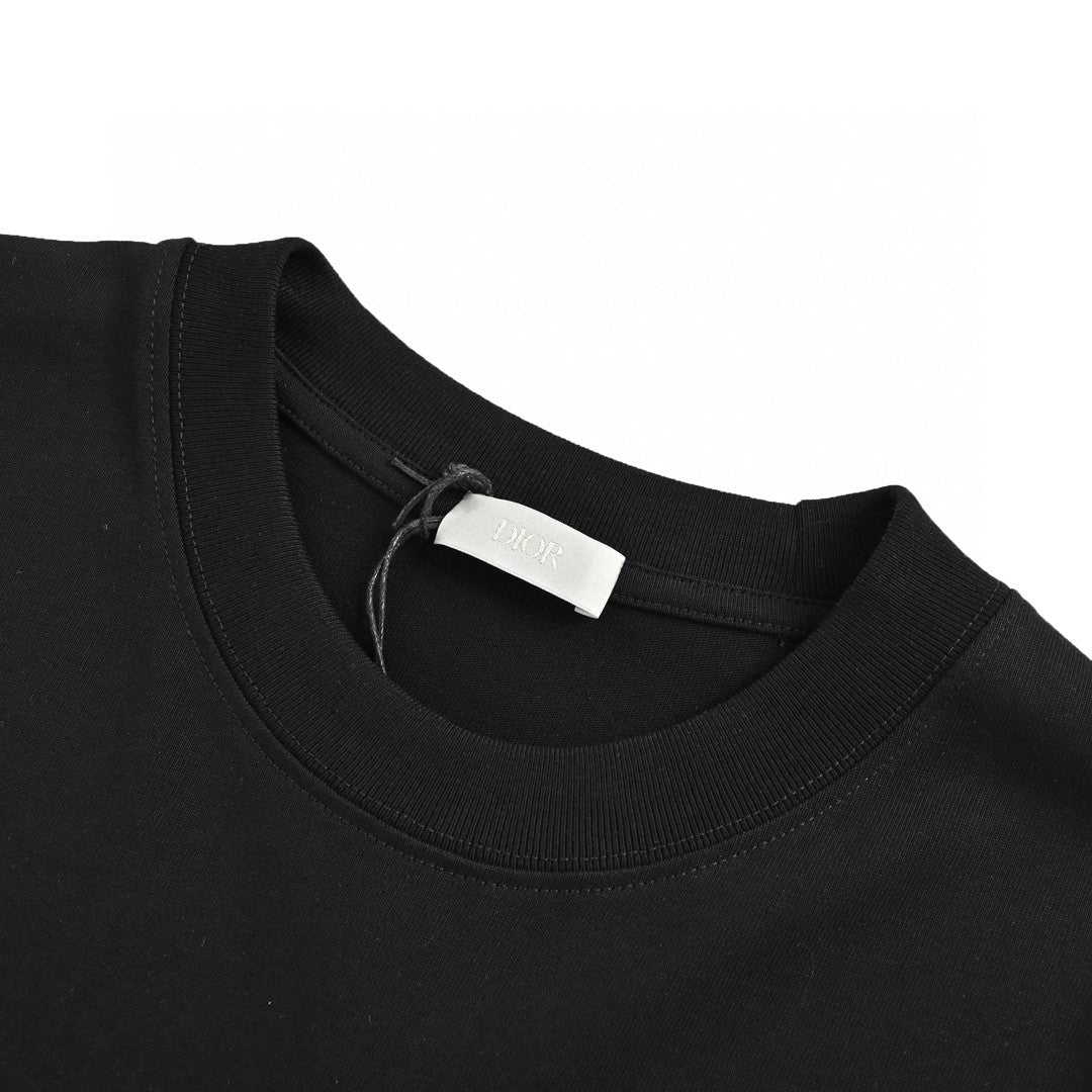 Dior Graffiti Logo T-shirt In - Black Unisex Streetwear Limited Edition - The Dior Graffiti Logo T-Shirt in black is a striking piece that combines the boldness