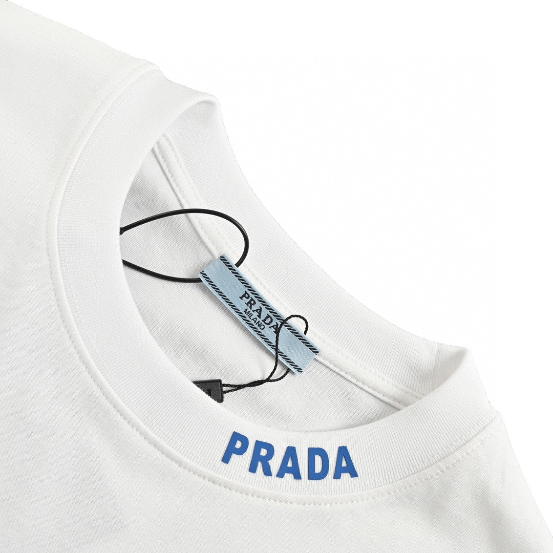 Prada Triangle Logo T-shirt - White Unisex Streetwear Limited Edition - This Prada t-shirt showcases the classic Prada triangle logo on the chest. Crafted from premium