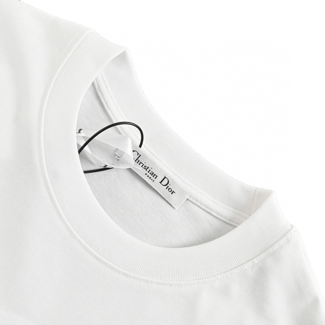 Dior Scribble Design T-shirt - Black Unisex Streetwear Limited Edition - This Dior t-shirt features an abstract scribble design in black on a white background. Made
