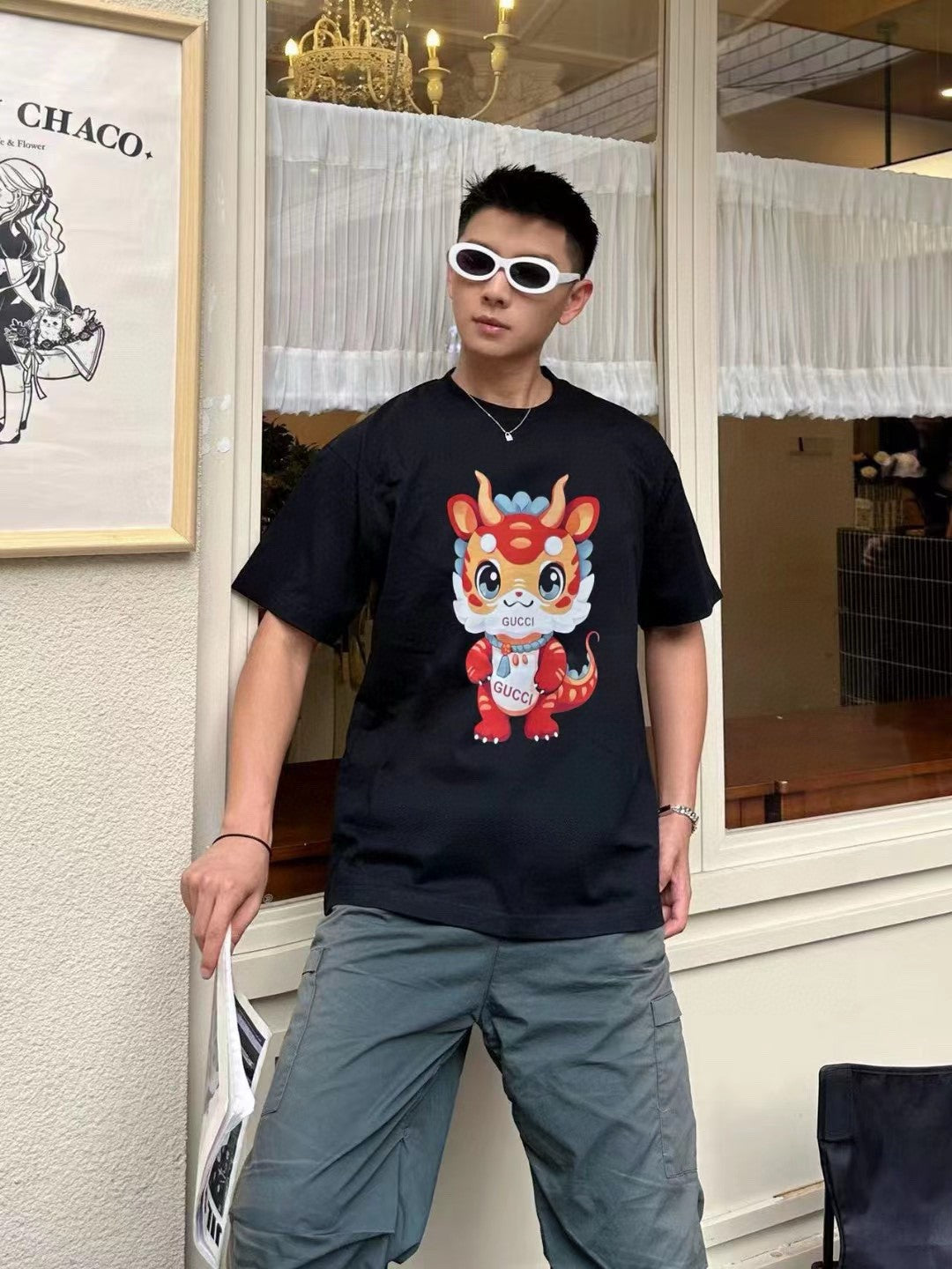 Gucci T-shirt With Dragon Cartoon - Black Unisex Streetwear Limited Edition - <span>Playful and vibrant. Features a colorful dragon cartoon. Gucci logo on the character. Made from